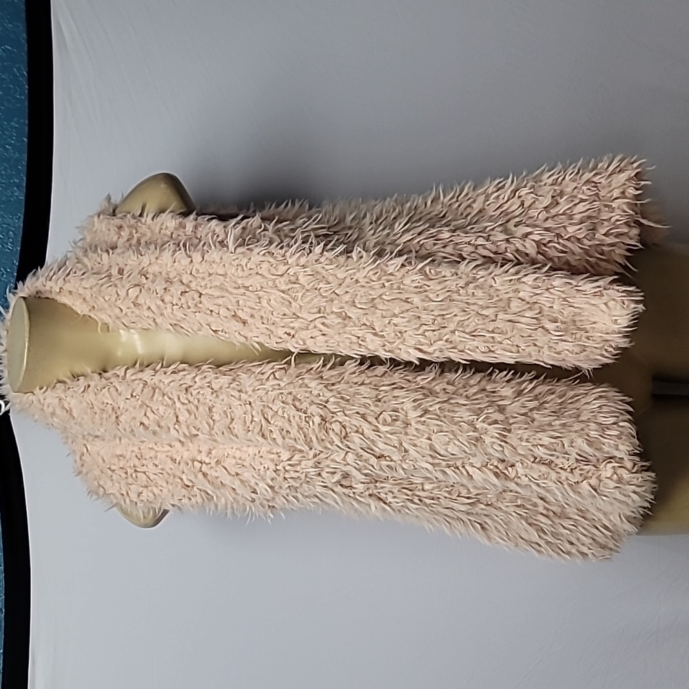 Size medium vest from pink owl